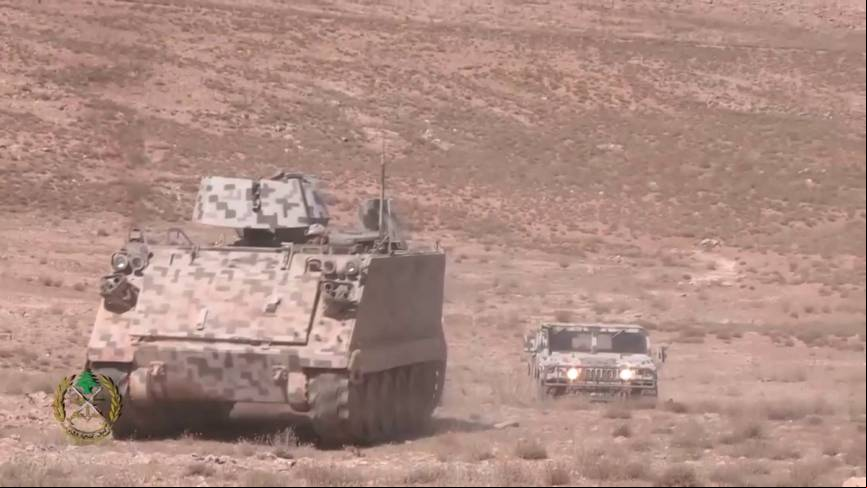 Un M-113, que lleva la protecci