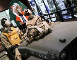 En primer plano en Jeep Wllys con las marcas de la FAEM, detr